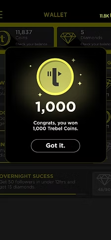 Music app reward screen confirming 1,000 coins earned